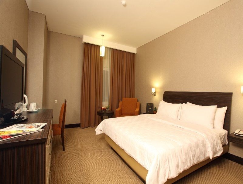 Swiss-Belhotel Kendari Rum bild